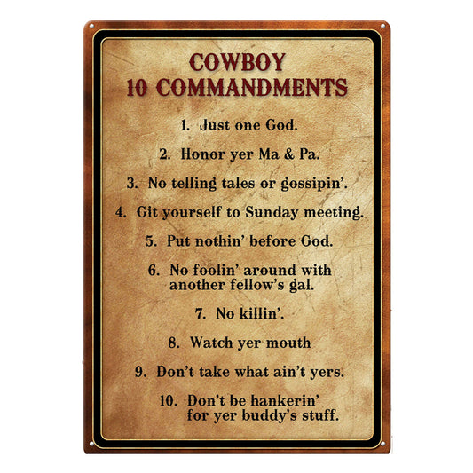 . The sign features the message 'Cowboy 10 Commandments' and lists all ten in stylized letters against a distressed-looking background. The sign is accented by a brown and black border. Its overall dimension measures 17 inches by 12 inches wide, has rolled edges and pre-punched corner holes for easy wall mounting.