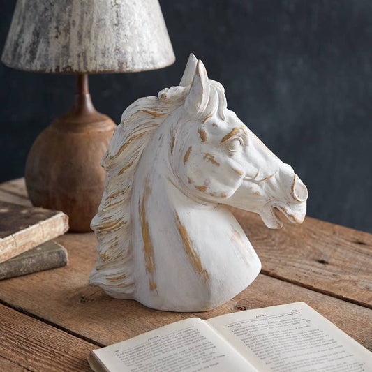 This magnificent horse head imitates the elegance that Romans used in their architecture while keeping true to contemporary style. Feature on a table or shelf for a quick sophisticated touch in a room. Item is made of resin.