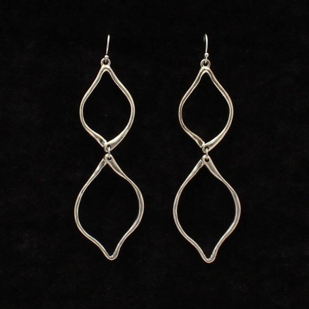 These stylish earrings are a double loop design in a hammered silver finish. Measure 2" long on French hooks.