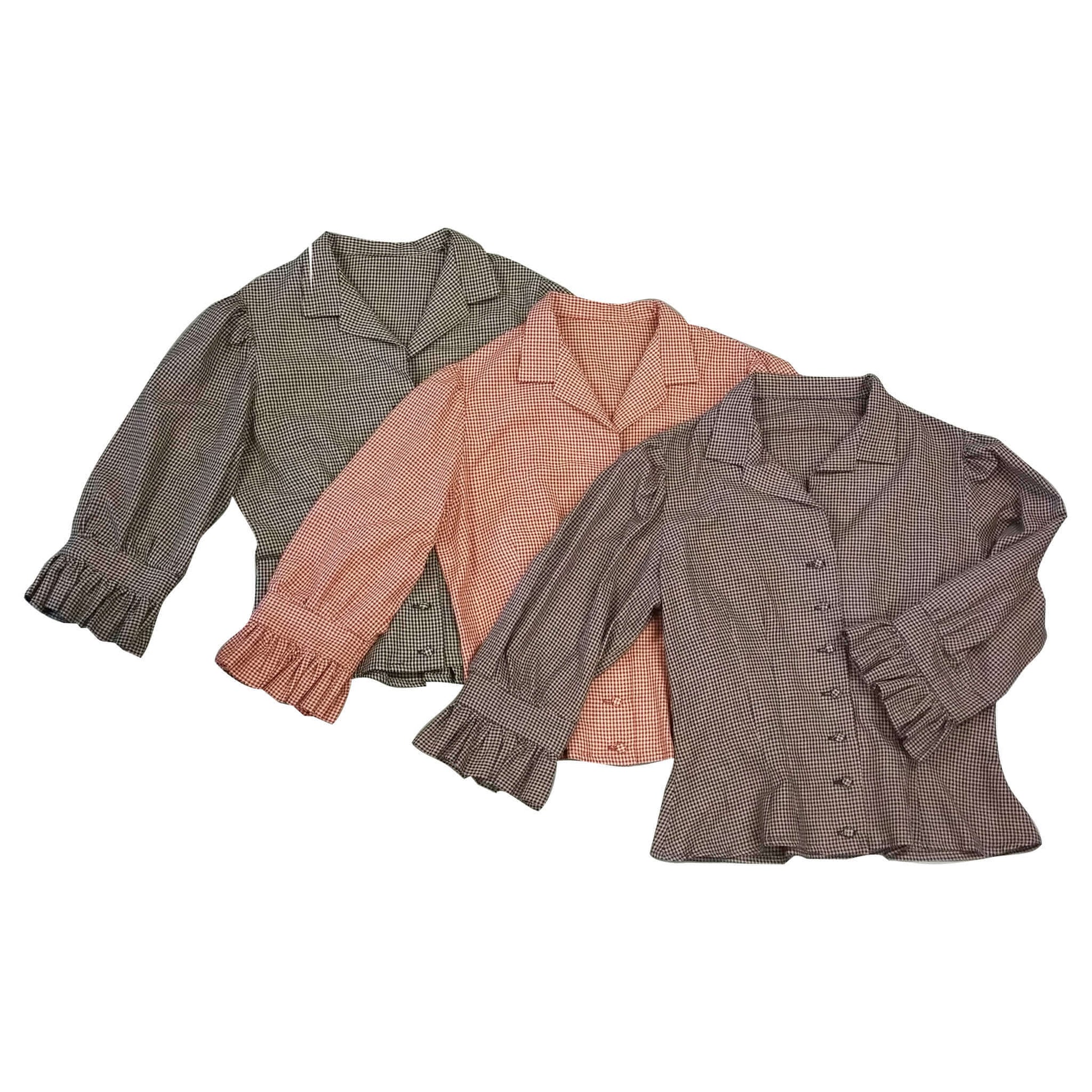 Checkered Angel Blouse in three colors with ruffled sleeves and button closure, perfect for stylish country outfits.