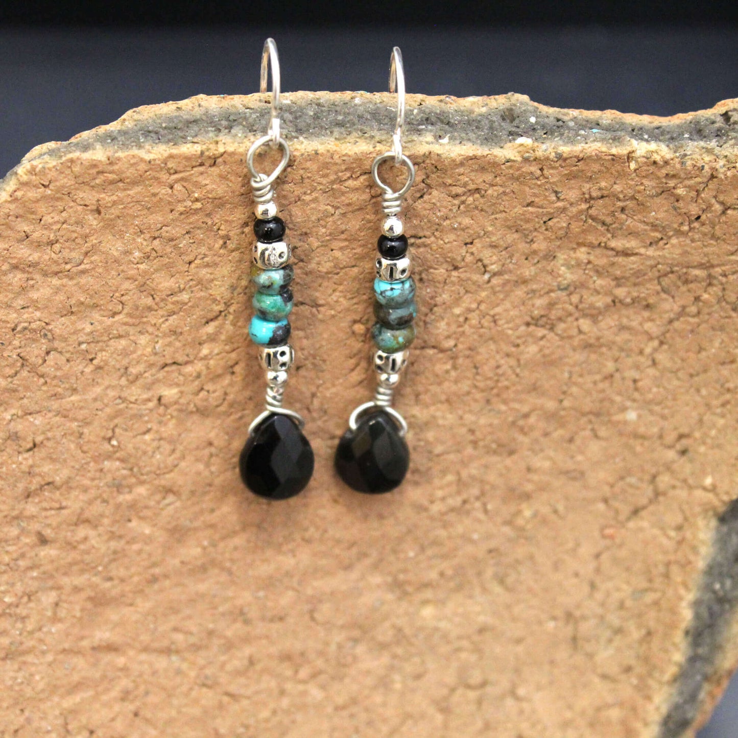 Run wild with this faceted black onyx pair. This measures approx. .40″ across and 1.25″ from the base of hypo allergenic ear wires. Each pair has its own unique features.