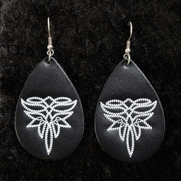 Black Boot Stitch Ladies Western Earrings with teardrop shape and white boot stitch design on black leather.