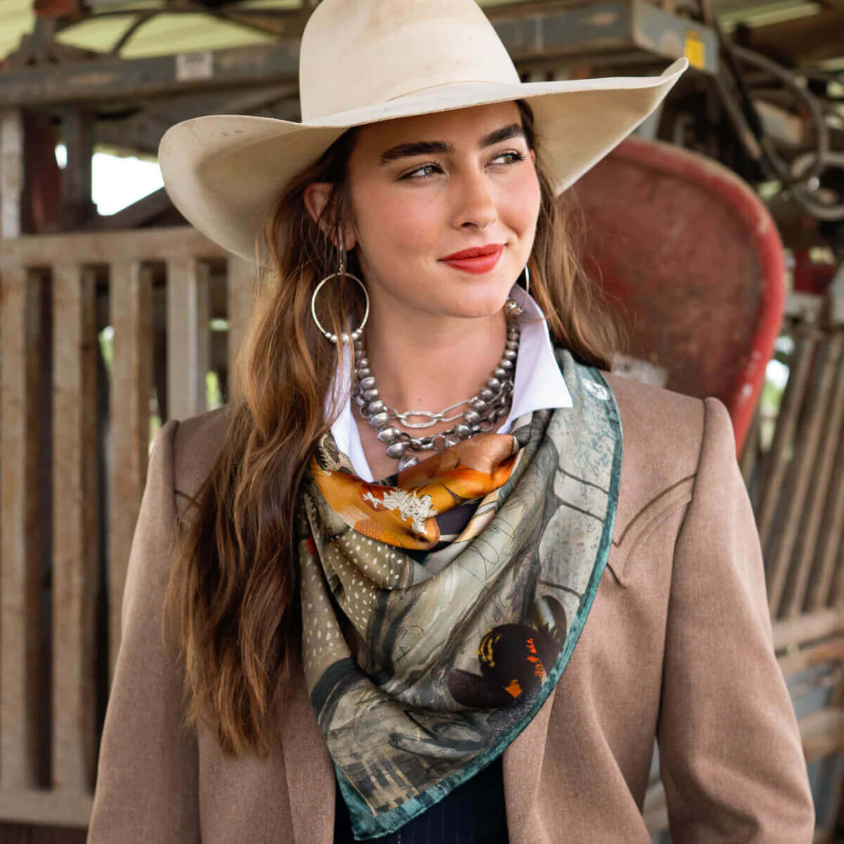 Model showcasing the Blue Melodies Horse Design Western Silk Scarf with a cowboy hat and stylish outfit.