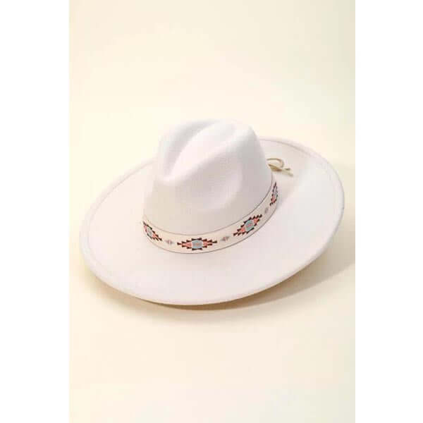 A must have trending fedora hat created with a Boho tribal pattern strap fedora hat design. A perfect gift for the upcoming season. Adjustable inner string.