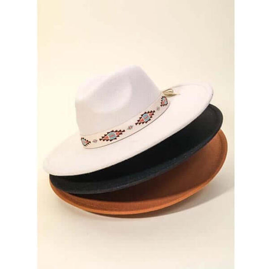 A must have trending fedora hat created with a Boho tribal pattern strap fedora hat design. A perfect gift for the upcoming season. Adjustable inner string.