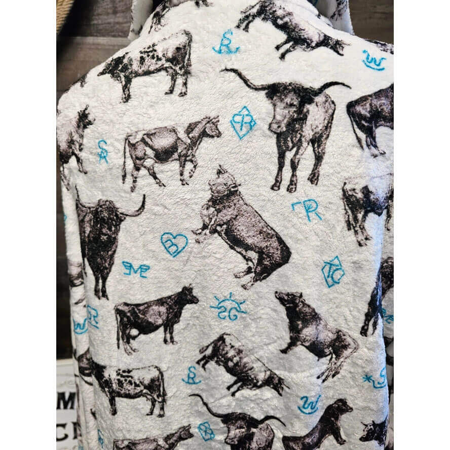 Robe with cow pattern on a white background