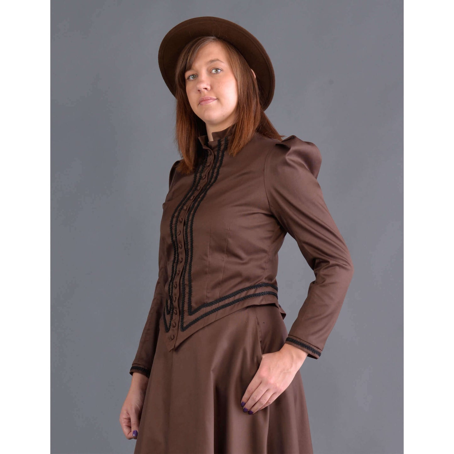 Designed for the horsewoman, this classically tailored Riding Jacket looks handsome with or without the horse. The jacket is very fitted with soutache trim and fabric covered buttons. This jacket and our riding skirt together makes a wonderful combination of tailored fit and comfort so if you ride a horse or just want to look like you do, this is the outfit.