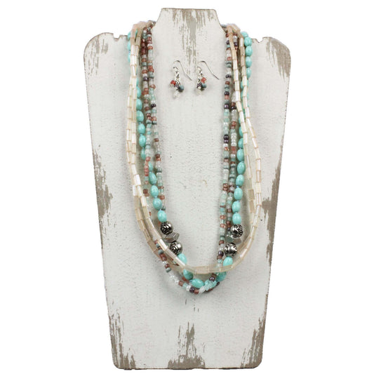 Five Strands of multi-colored beads are the focal points of this eclectic set. Rose shaped accent beads enhance its versatility. Overall length of necklace is 23ā³ with a lobster claw clasp and extension chain. Matching earrings on hypoallergenic ear wires finish off the look
