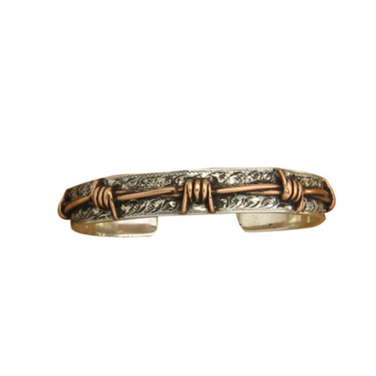Sterling Silver 3/8” cuff bracelet with copper barbed wire accents, antique finish.  Hand engraved and in USA. Exceptional Quality. Note: Please allow 3-4 weeks for your order to ship as they are made when ordered.