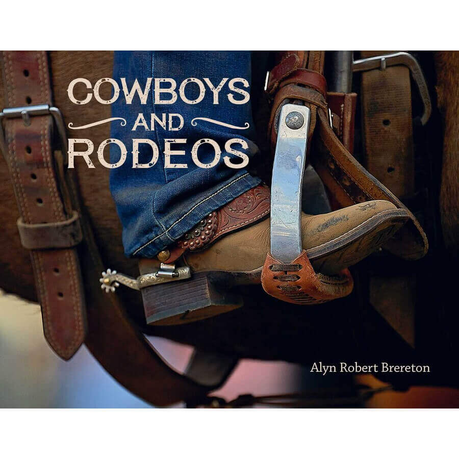 Book cover of 'Cowboys and Rodeos' with a cowboy boot, spurs, and saddle.
