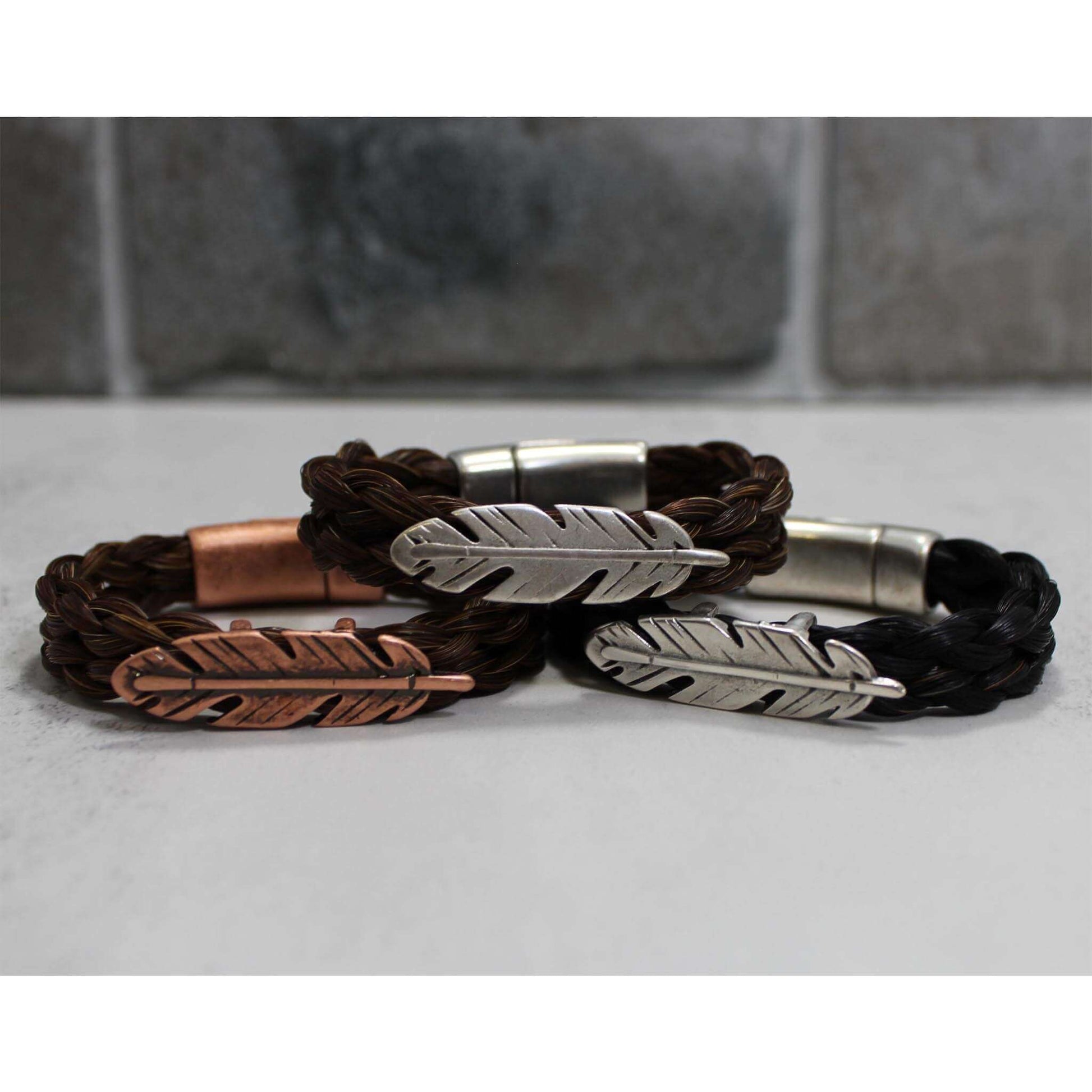 The feather is a symbol of connection with spirit in many cultures. Whether it is the power of an eagle feather or an angel's wing. It means you are being protected by the higher power you believe in. Each piece is finished with a sturdy magnetic clasp. Designed to be worn fitted vs loose, you can get the bracelet wet, but we recommend you remove it to swim or shower.