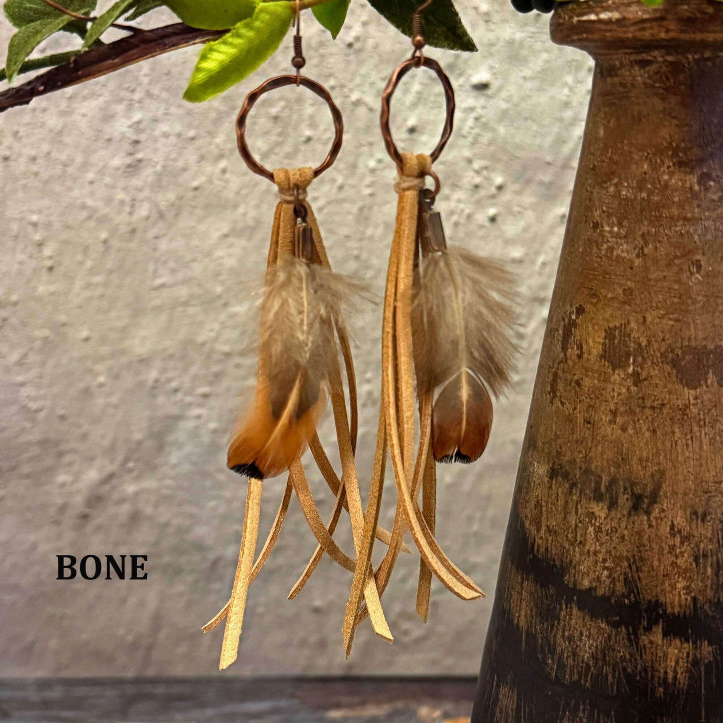 Feather and Leather Tassel Western Earrings featuring natural feathers and deer skin leather in a bone color.