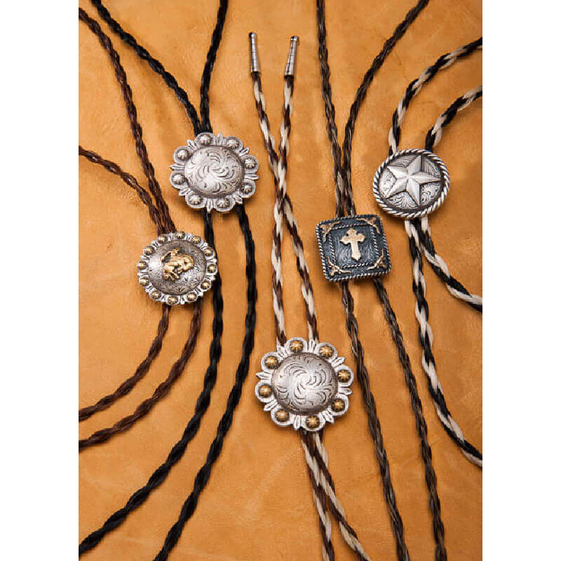 Finally the western classic you've been looking for! Choose from several Concho designs that feature a solid or two-toned horsehair loop and metal bolo closure. Approximately 35" long.