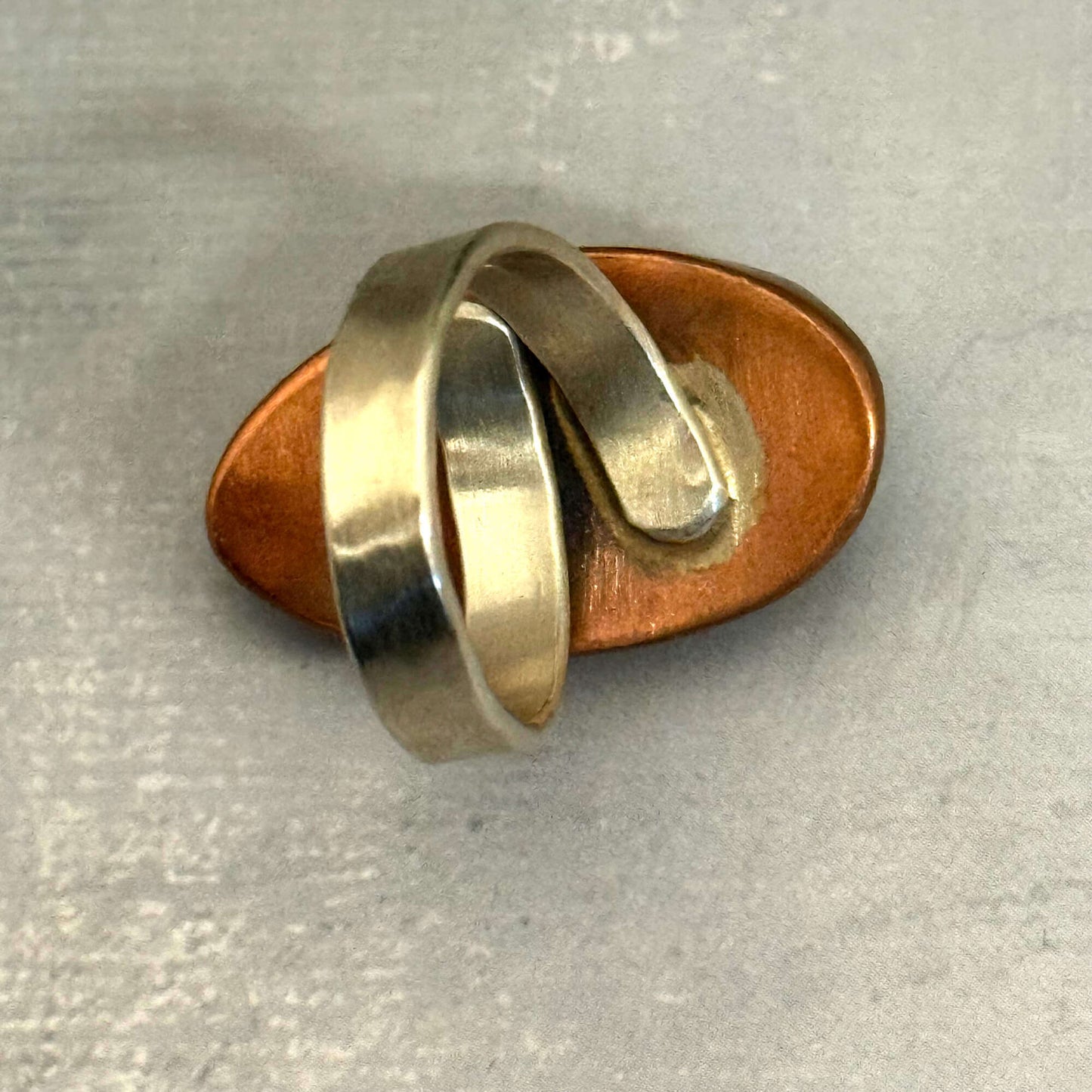 J Marie Genuine Turquoise Ring with adjustable silver band and natural turquoise stone, showcasing unique handmade design.