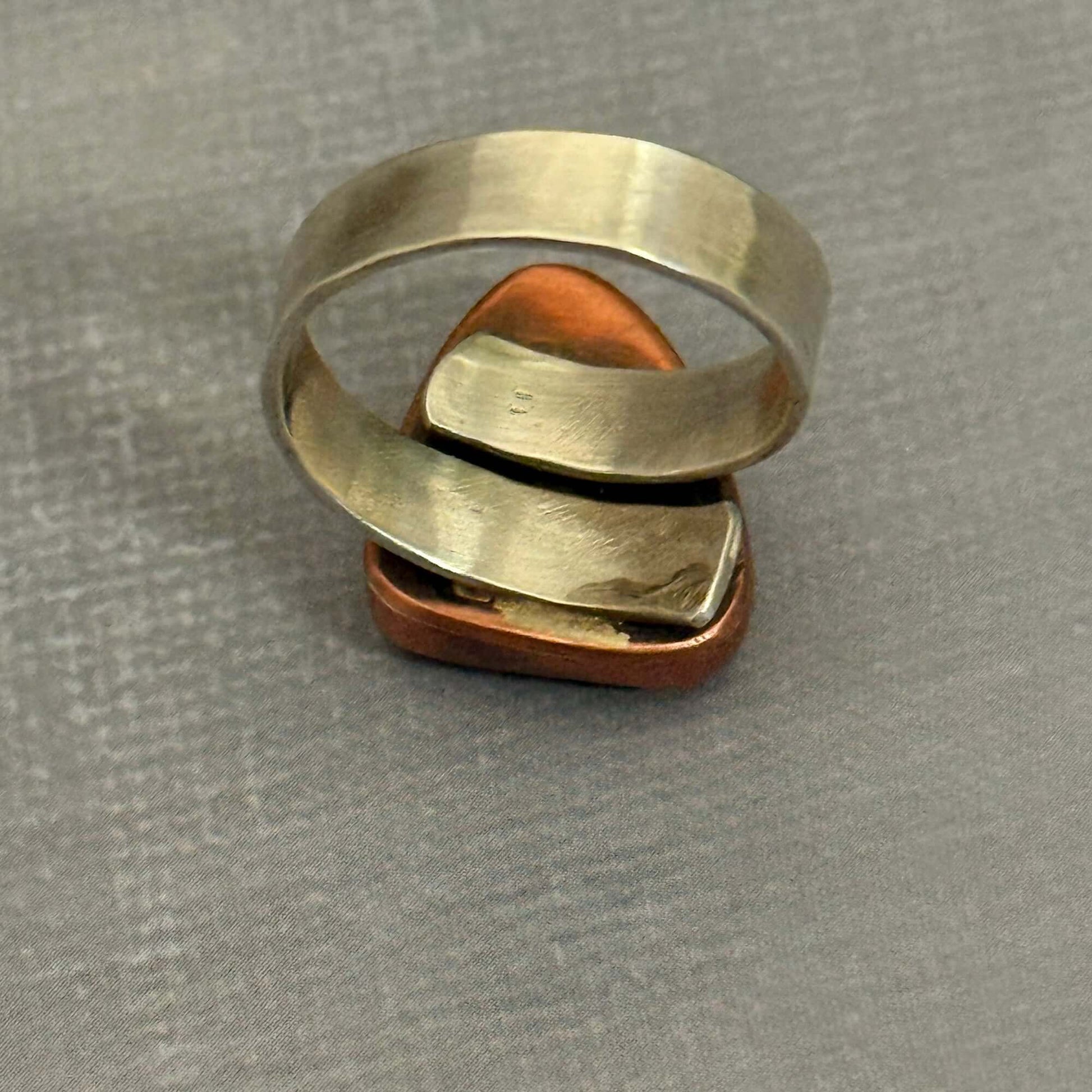 Handmade J Marie Genuine Turquoise Ring with adjustable band, featuring unique turquoise pattern and vibrant color.