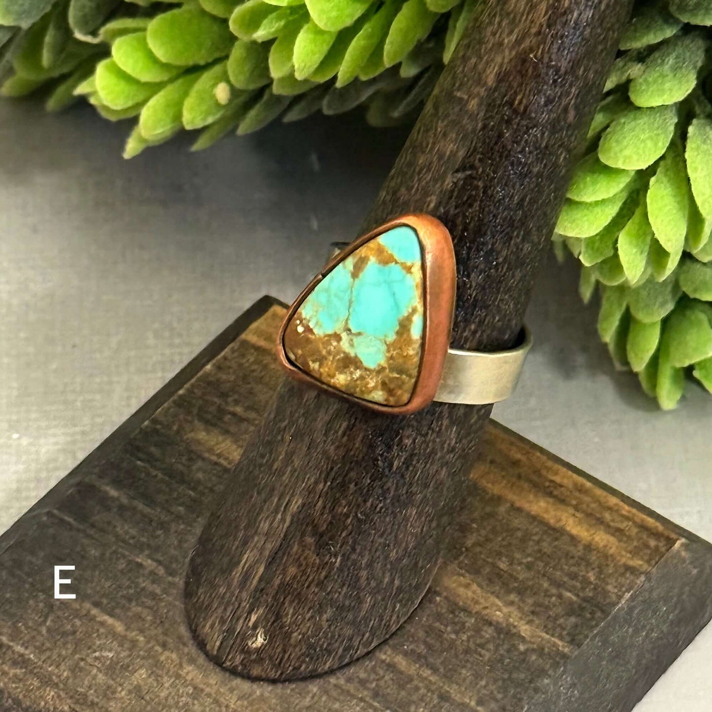 J Marie Genuine Turquoise Ring featuring a unique triangular turquoise stone on an adjustable band.