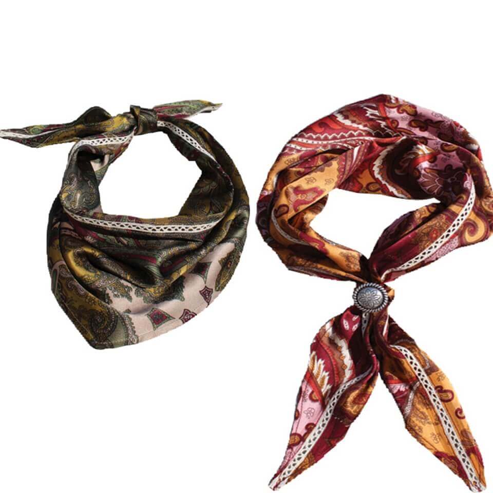 A unique diamond shape scarf made for the special buck-a-rette. Delicate lace insert adds a feminine touch to the scarf and matches our Maybelle Vest. Made in USA. 100% Silk with Cotton Lace Inset. Diamond shape 36” long with 19-½” sides.