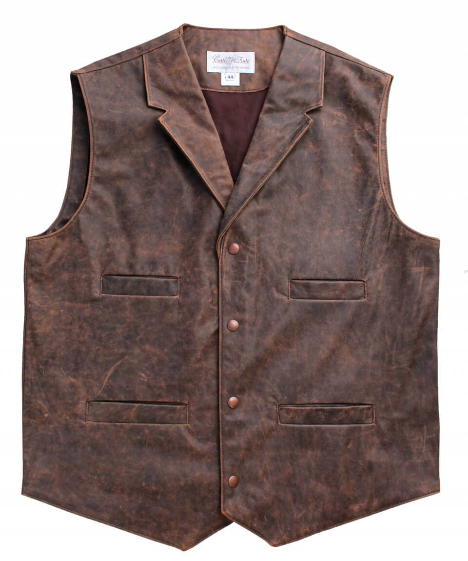 This authentic western style vest is perfect for everyday wear or Old West Re-enacting. Our Leather Frontier vest is crafted front and back from rugged genuine leather with a rich distressed finish. A classic cut with back yoke and four handy welt pockets. Vest is lined in cotton twill and has a copper snap closure. Made in USA. Dry Clean