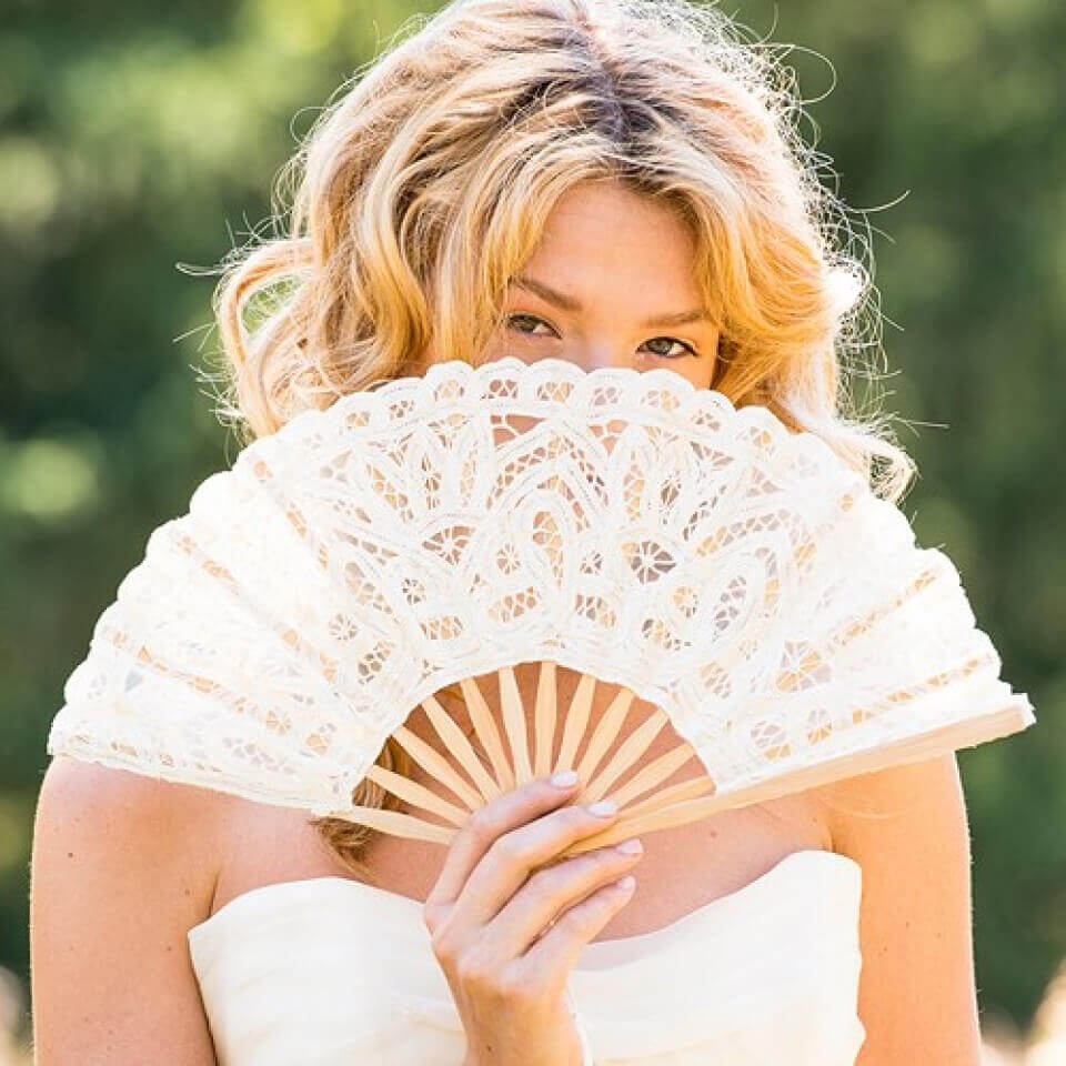 Fans were used to help keep women cool under all those layers and added an elegant touch to their outfit. Twin tassels would adorn the fan so women could hang it around their wrist. Makes a great wedding accessory for pictures while helping cool you down.