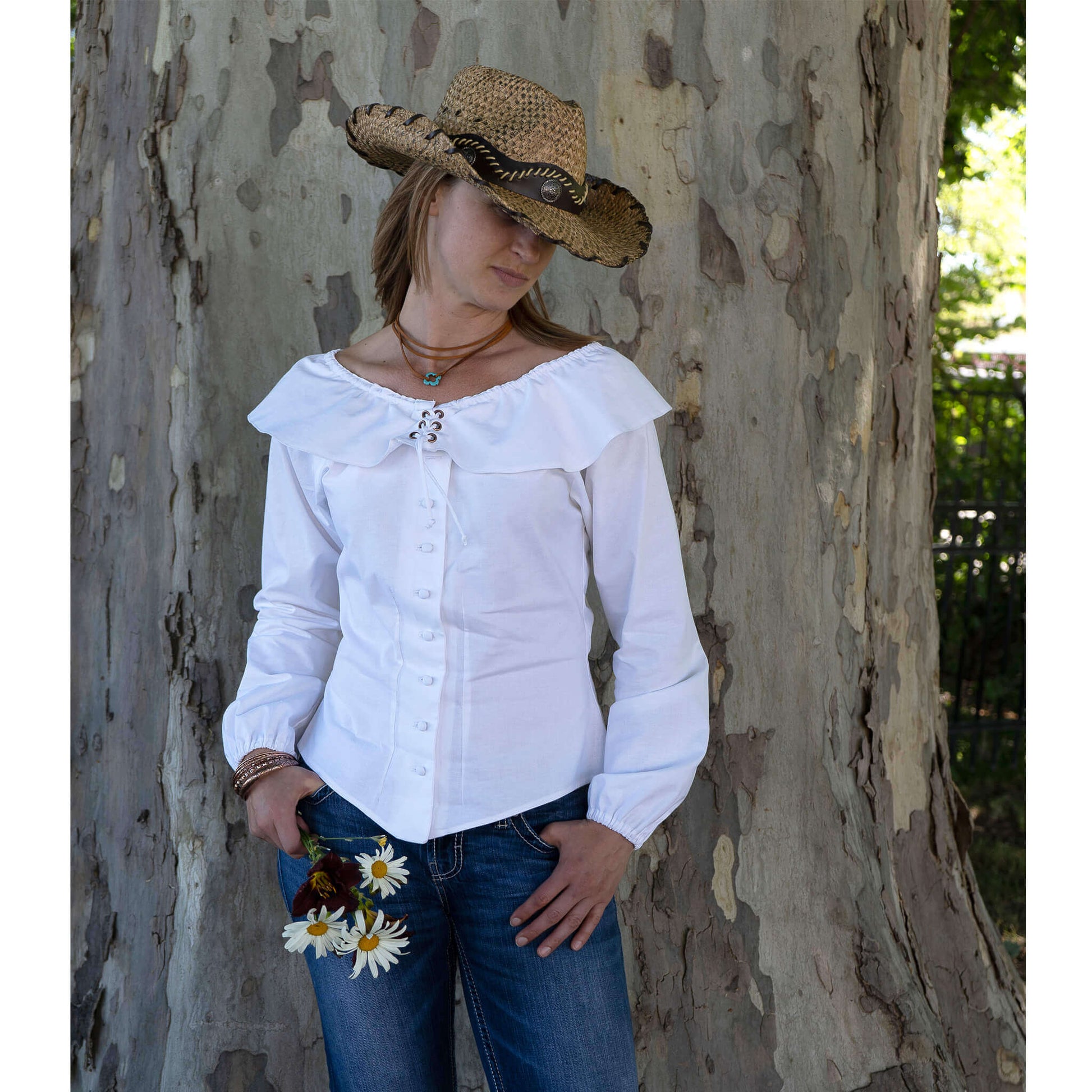 Marston Ladies Western Cowgirl Blouse, off-shoulder design, long sleeves, styled with jeans and hat, outdoor setting.