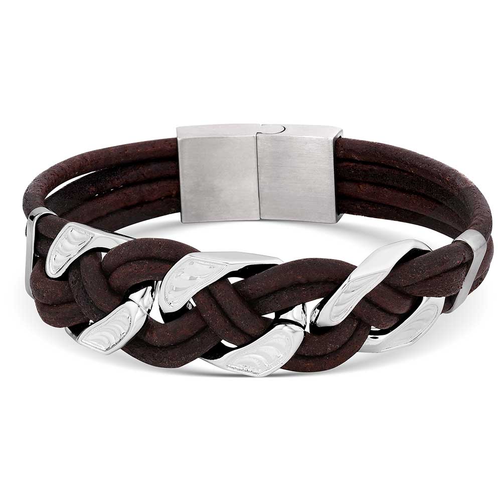 Stand out from the crowd with the Rustic Braided Bracelet. Brown leather and silver tone intertwine with the dark brown cord to create a unique braided design. This bracelet features a slide and lock clasp for ease of wear. Approximately .75" wide and 8.5" long.
