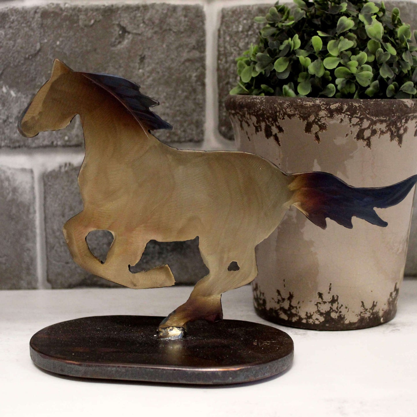 The Metal Running Horse is a must-have for horse enthusiasts, ranchers, and anyone who wants to add a touch of the old west to their home or office décor. This conversation--starting sculpture makes a fantastic housewarming or holiday gift!