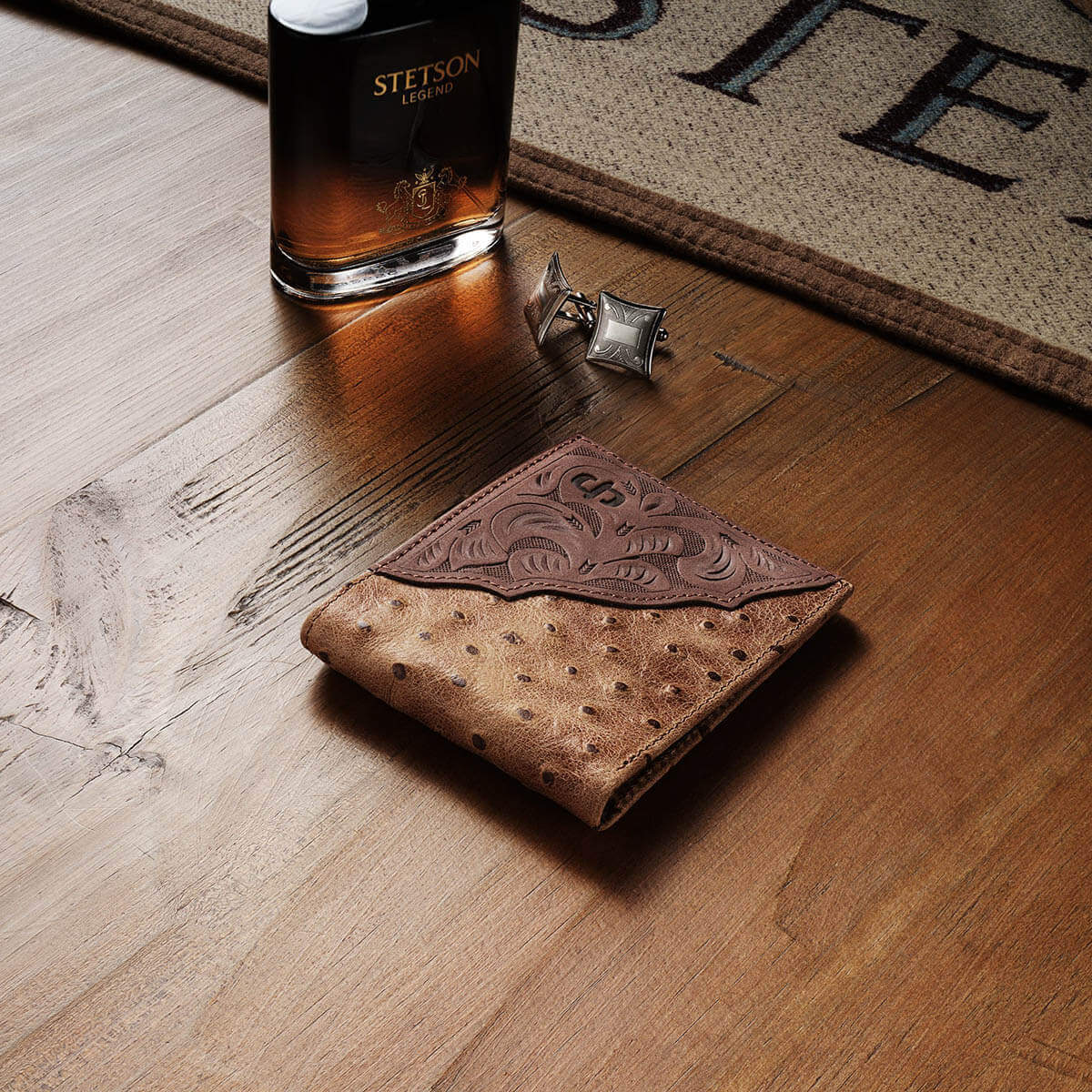 Made from top-grain leather, these wallets feature a embossed ostrich print and a tooled brown leather western overlay with an embossed Stetson ® logo. At once rugged and refined, each wallet embodies our legendary commitment to quality and attention to detail. Imported.