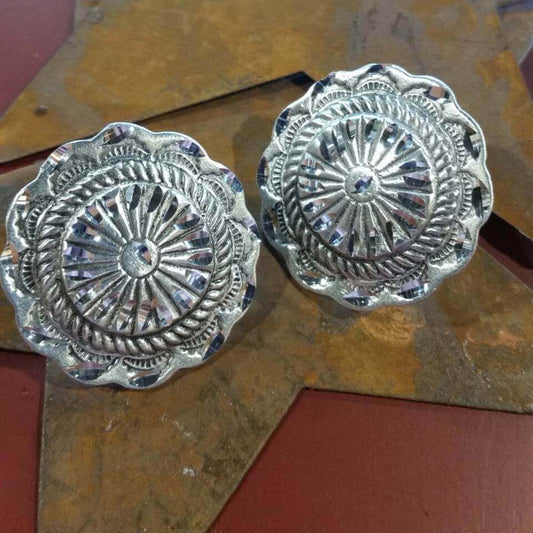 Destiny pewter jewelry are made of fine jeweler's pewter that is extremely lightweight and has a brilliant shine. Each piece is handmade and hand finished with diamond cuts. The sparkly cuts give each piece a unique dazzling sparkle. Approximately 1" diameter. Made in USA