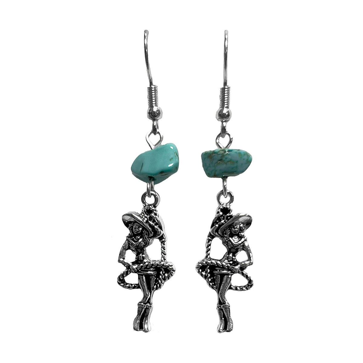 A pair of silver-toned dangle earrings featuring a small turquoise-colored stone and a dangling cowgirl figure charm, shown against a plain white background.