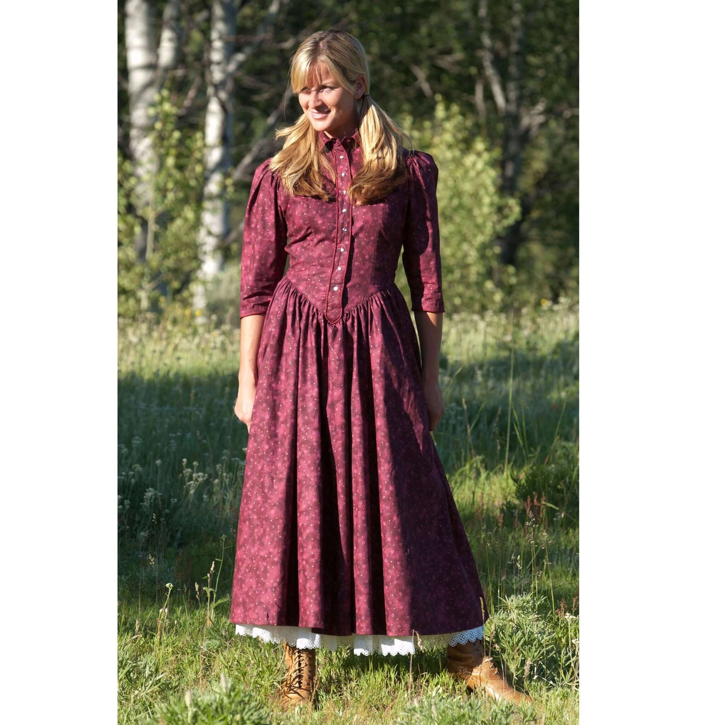 Woman wearing Prairie Dancer Western Dress in a field, featuring pearl buttons and 3/4 sleeves, perfect for warm gatherings.