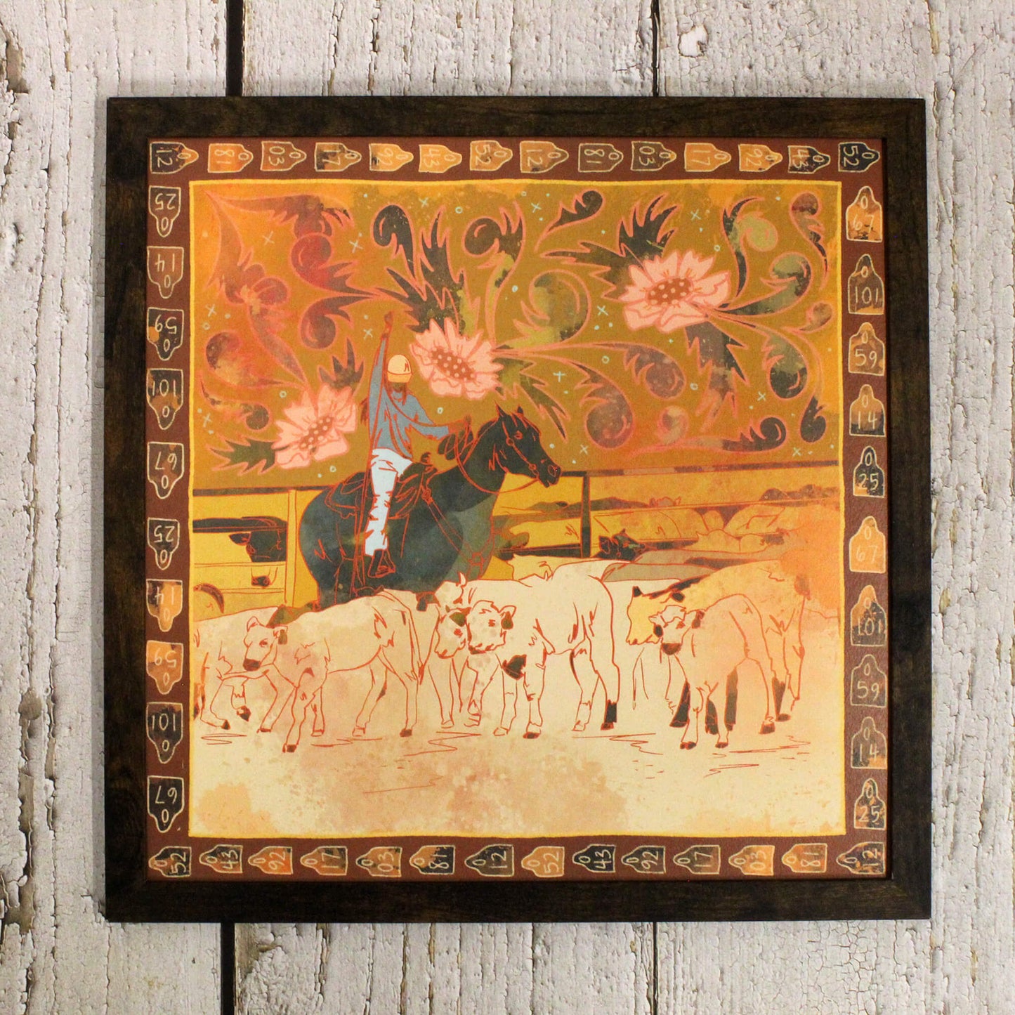 Decorative painting of a person on horseback with floral elements in a wooden frame.