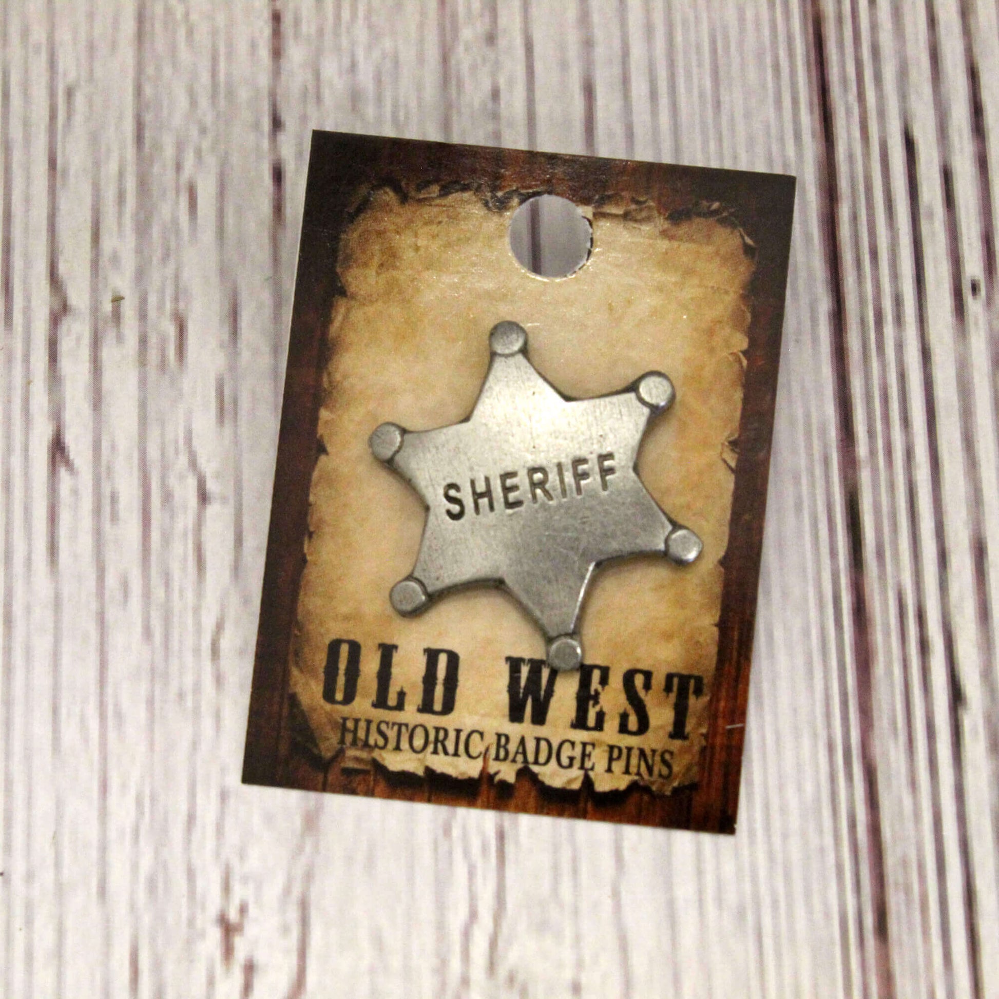 Sheriff badge pin on a 'Old West Historic Badge Pins' card with a rustic background.