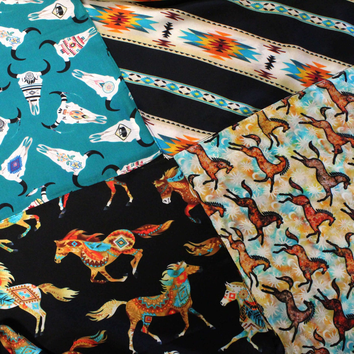 Collection of fabric swatches with animal patterns including horses and cow skulls