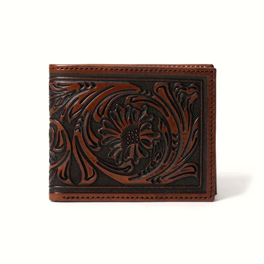 Brown leather wallet with intricate floral tooled design on a white background