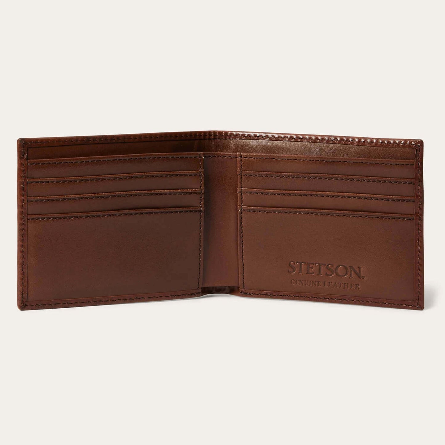 Brown leather wallet with 'Stetson' branding on a white background