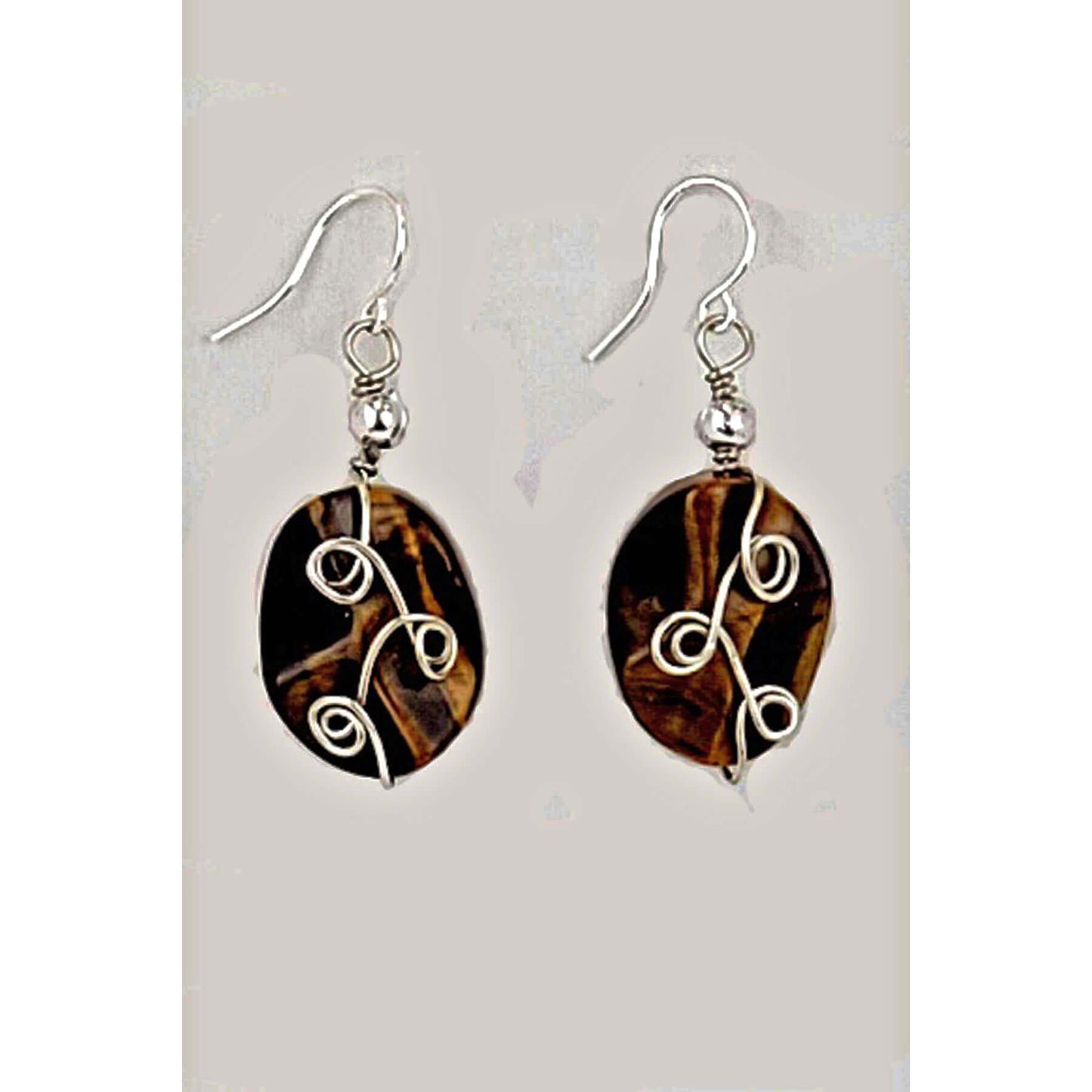This stone brings good luck and protection. Measures approx. .50″ wide and 1.25″ from the base of hypo-allergenic ear wires.
