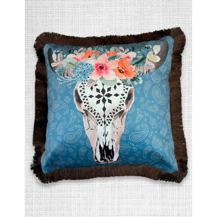 This Velveteen Fringed Pillow brings rustic charm and elegance to any space with its floral-adorned cow skull design on a paisley background. Crafted from soft velveteen fabric for a luxurious feel. Fringed edges add a decorative, rustic touch. Features a color-coordinated zipper closure on the back for convenience. Approximate size: 18" x 18"