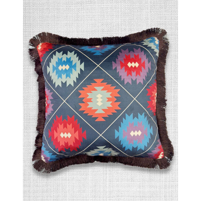 Decorative pillow with geometric pattern on a textured background