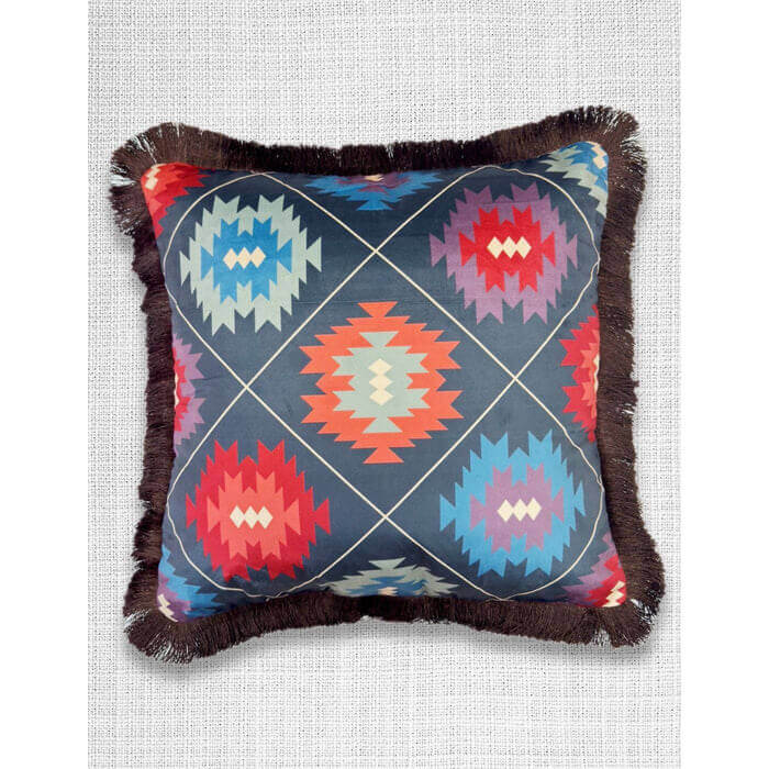 Decorative pillow with geometric pattern on a textured background