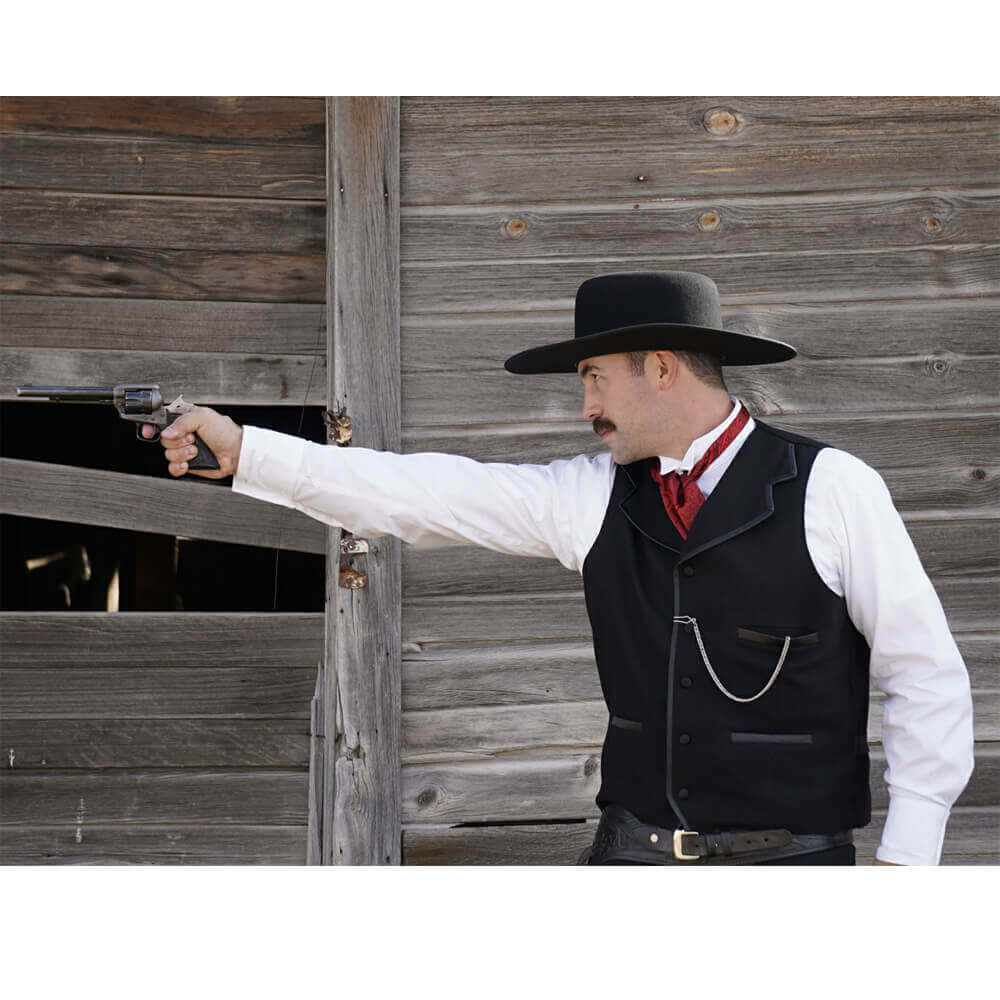 Similar to the vest worn by Kurt Russell as Wyatt Earp in “Tombstone”, this iconic style vest will help you walk the street in confidence. Notched lapels are sewn into the shoulder seam and trimmed in satin bias with three matching satin welt pockets and back belt. Made of 100% wool and lined in polyester. Dry Clean. Made in USA.