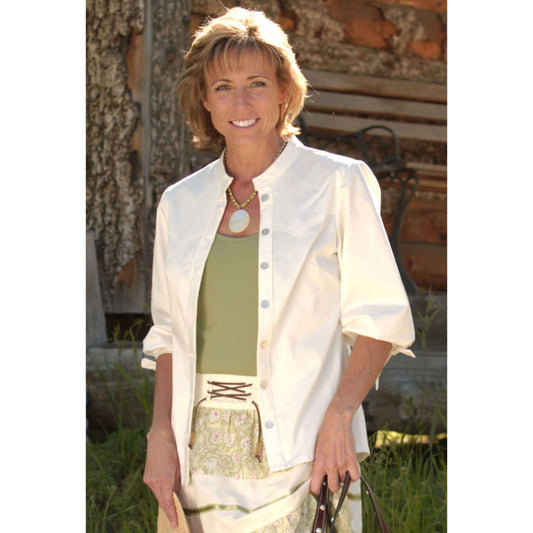 Stylish western American ladies shirt in cream cotton, paired with a green top and paisley skirt, perfect for summer.