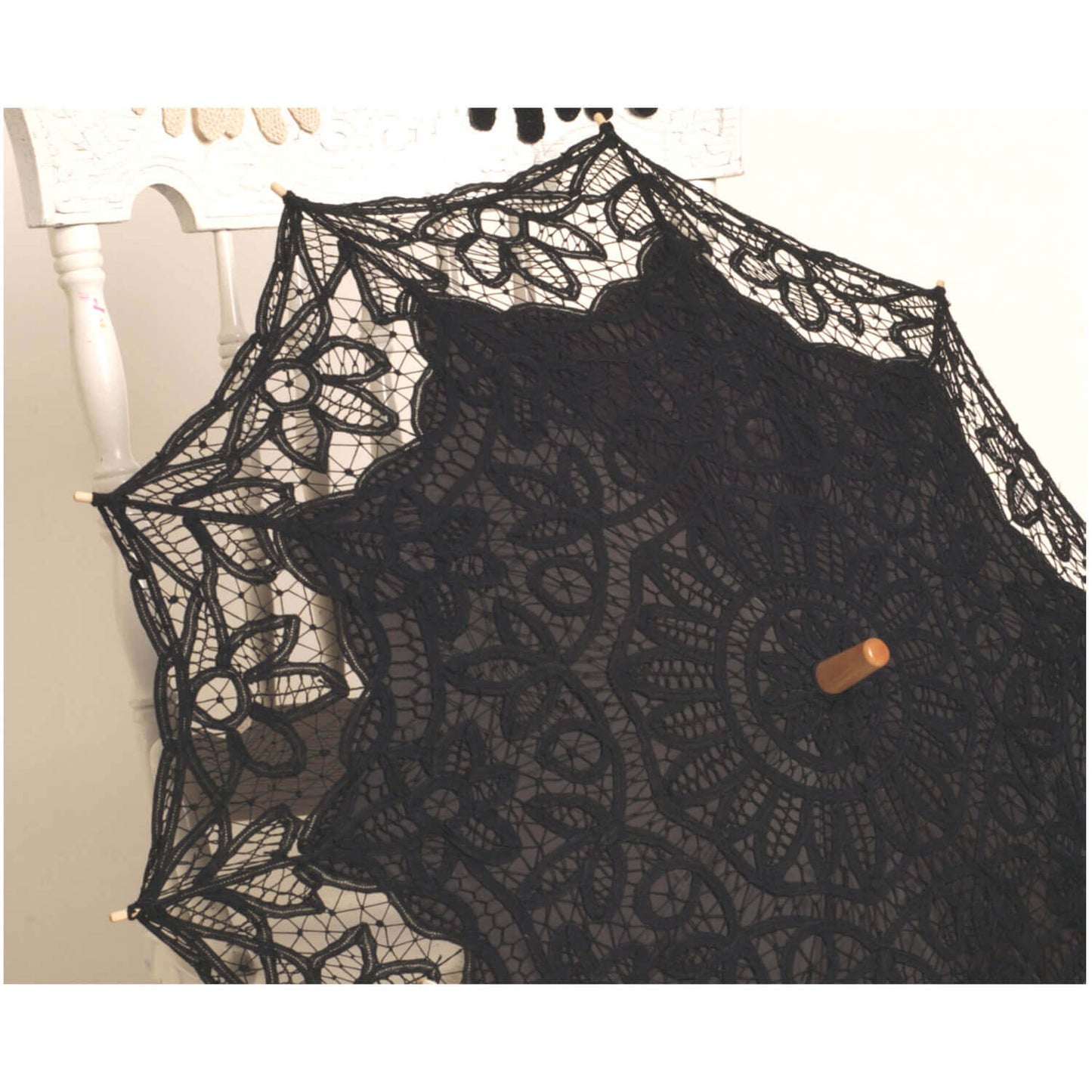 Women from all social standings carried parasols in the summer for functional use to keep them cool and protect their fair skin. We carry three colors to compliment your outfit, now in black, white and ecru Battenberg lace.