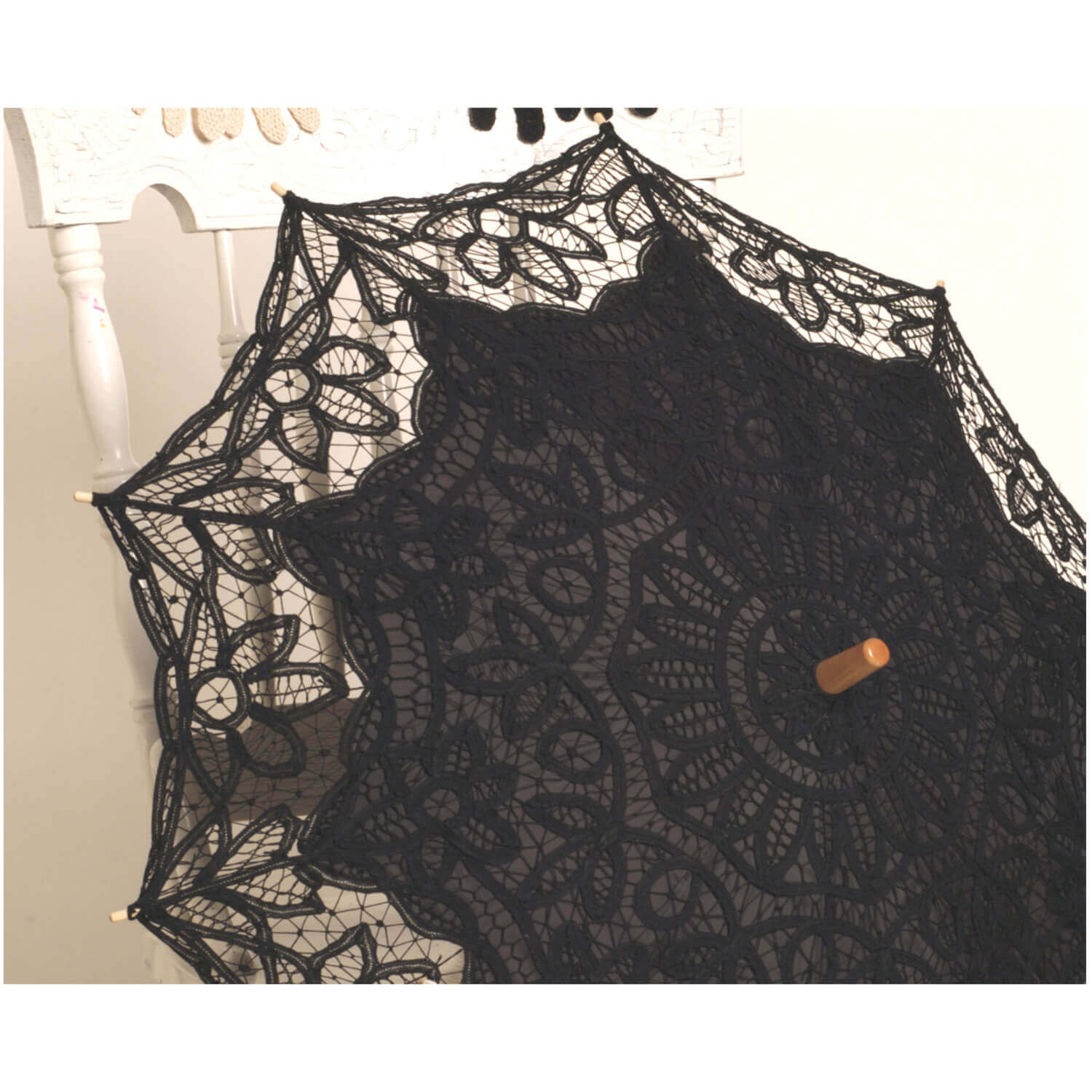 Women from all social standings carried parasols in the summer for functional use to keep them cool and protect their fair skin. We carry three colors to compliment your outfit, now in black, white and ecru Battenberg lace.
