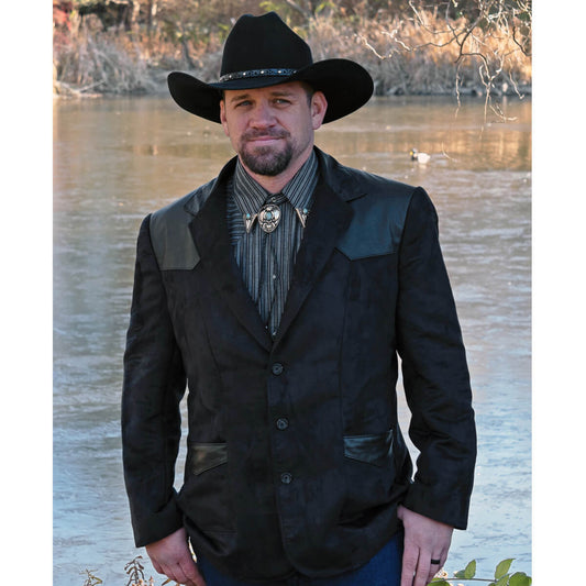 This western Blazer is our latest design in men’s western formal wear. The Blazer is made with buttery soft micro-suede fabric with contrasting genuine leather front and back yokes. The two front inset pockets have yokes accented with contrasting genuine leather for that classic western style. Blazer is fully lined and has an inside chest pocket with center back vent for easy movement. Pairs nicely with jeans or slacks. Dry Clean. Made in USA.