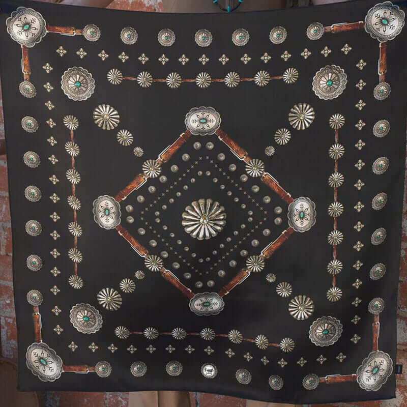 The Concho silk wild rag that has a rustic, vintage feel. A true classic! A vintage patina to this scarf to give it that distressed worn look. Dry clean preferred. Iron on silk setting or use steamer. 100% Satin Silk. 35" x 35"