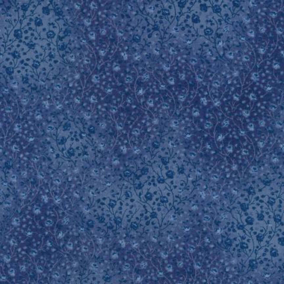 Periwinkle calico fabric with floral pattern, perfect for vintage-inspired dresses and sewing projects.