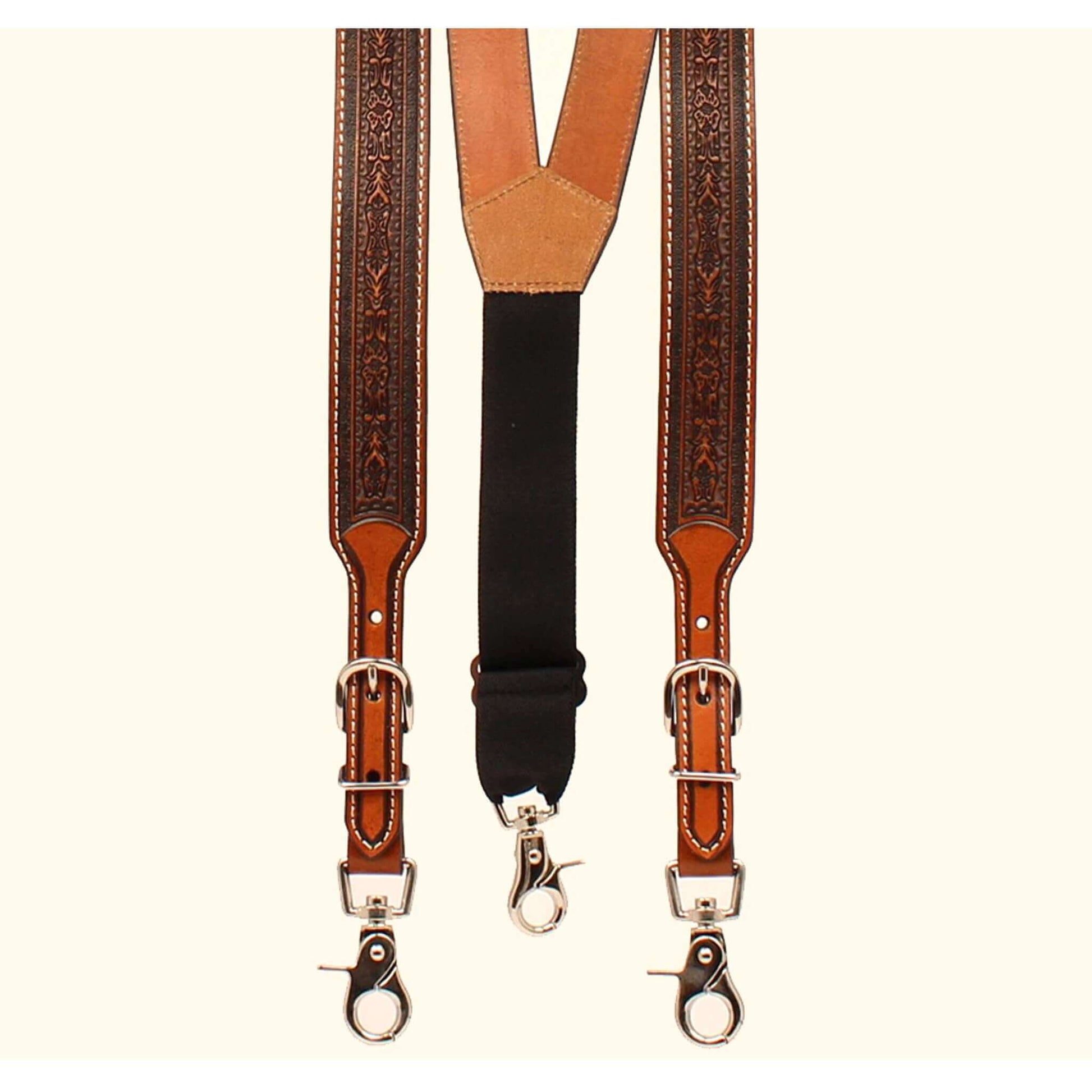 <span data-mce-fragment="1">Features decorative floral hand tooled leather straps with contrasting billets. These leather galluses attach to your pants with metal trigger snaps that secure to your belt loop.</span><span data-mce-fragment="1"> Imported </span>