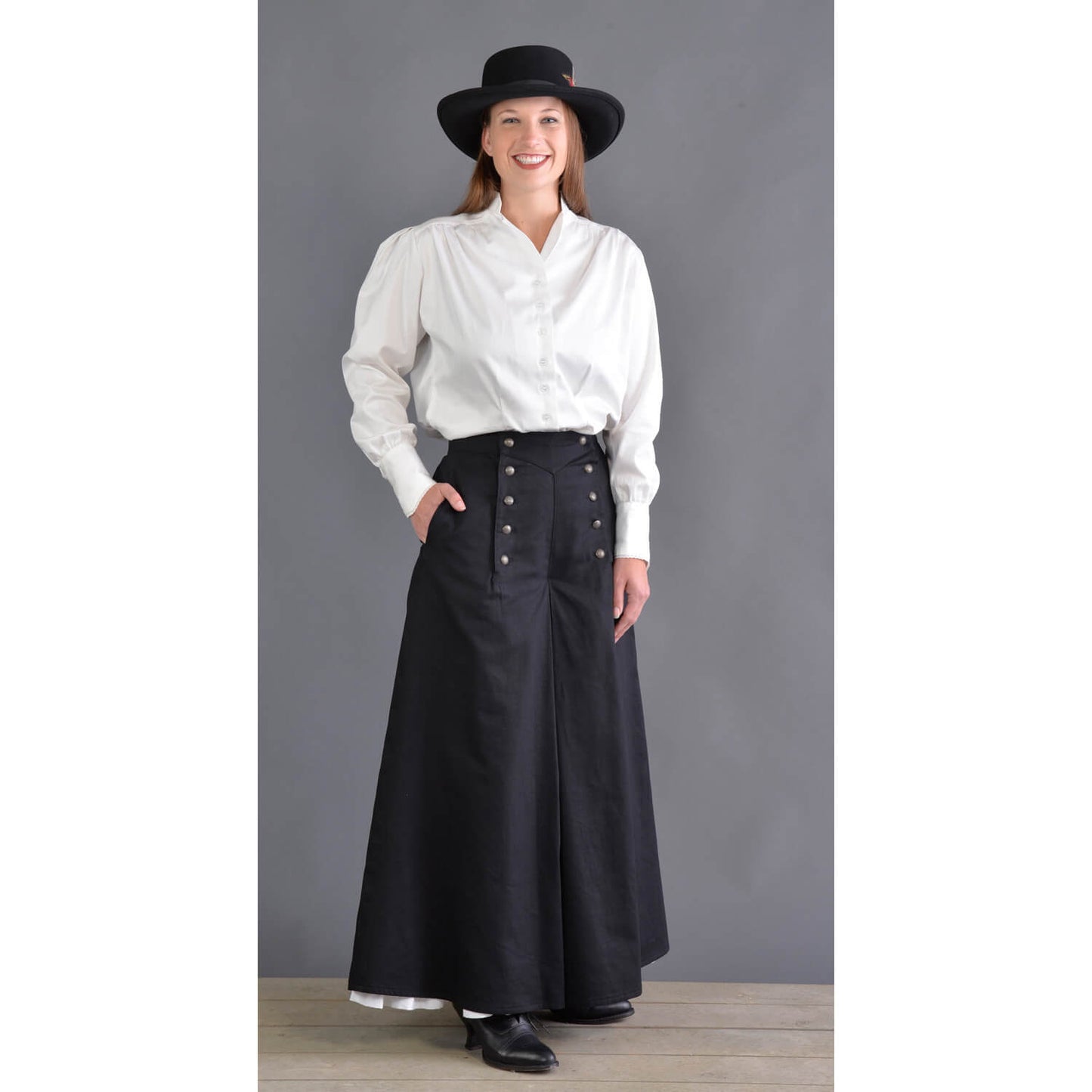 This split riding skirt design is our version of the popular riding skirt of the 1800’s. Cut with a slight flair, side pockets and front flap opening, this skirt allows ample movement for riding or walking. Victorian style buttons highlight the design and match the riding vest