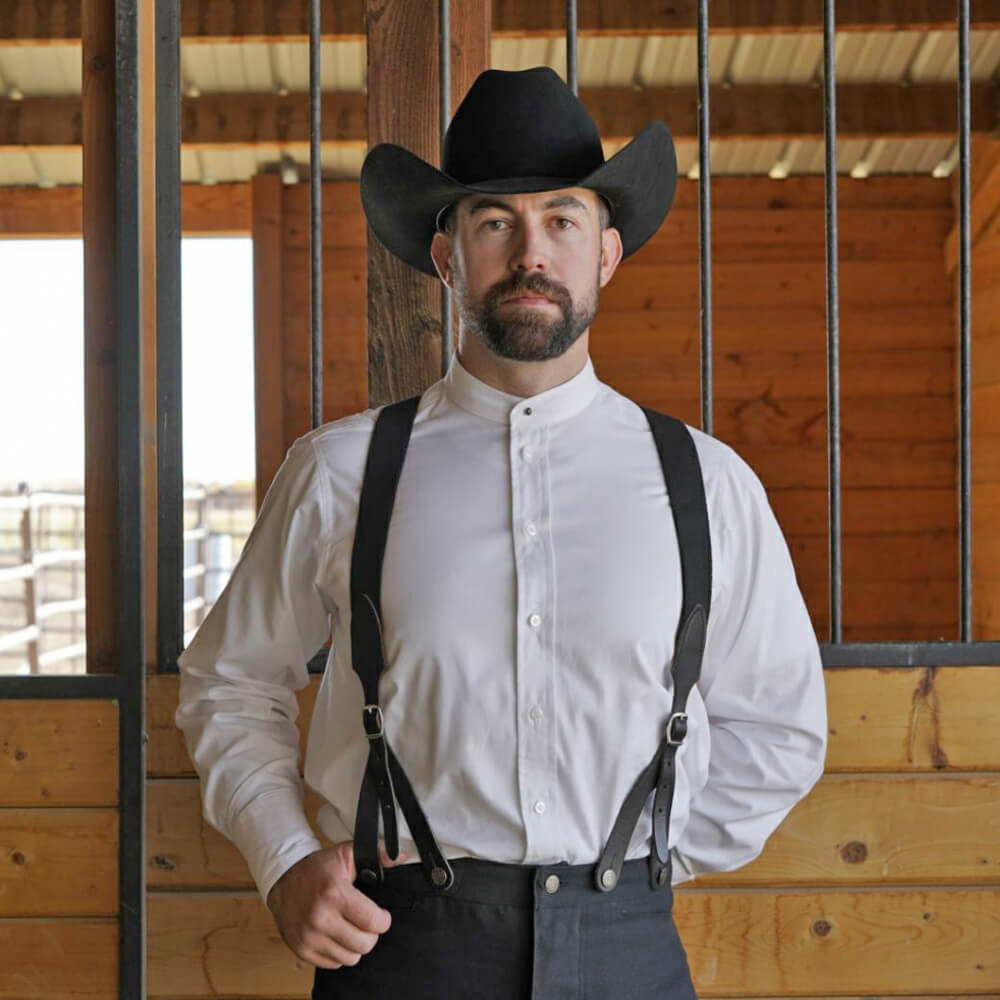 Grandfather probably wore a shirt like this with fine tailoring and pearl buttons. This shirt features a banded collar with a silver stud tack. It also comes with two attachable collars. You can add the tux collar for the fancier event or the rounded collar for a more traditional look. It’s like getting three shirts in one. Comes in fine pinpoint cotton. Made in USA.