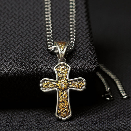 This Twister men's chain necklace features an antique gold floral scroll design on an antique silver cross. &nbsp;22" long.